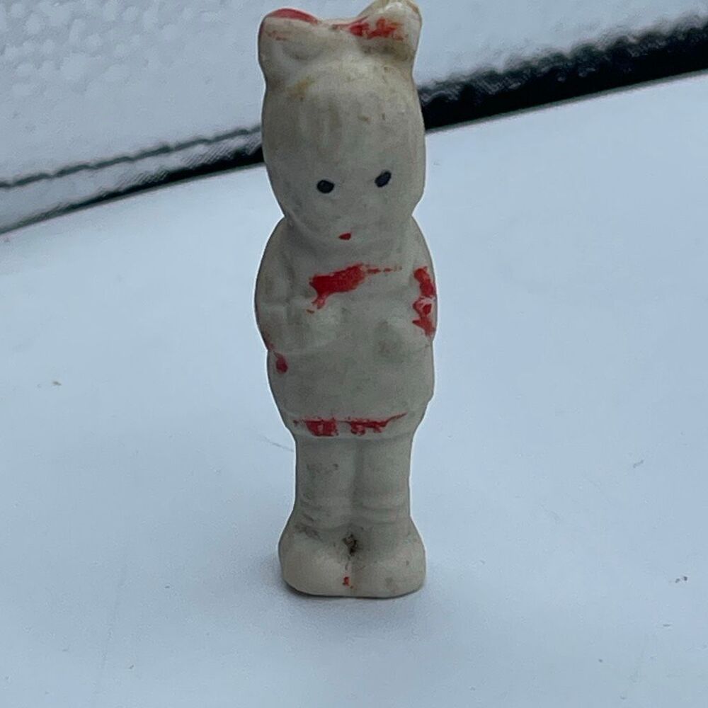 Vintage miniature bisque Japan Frozen Charlotte or penny doll.